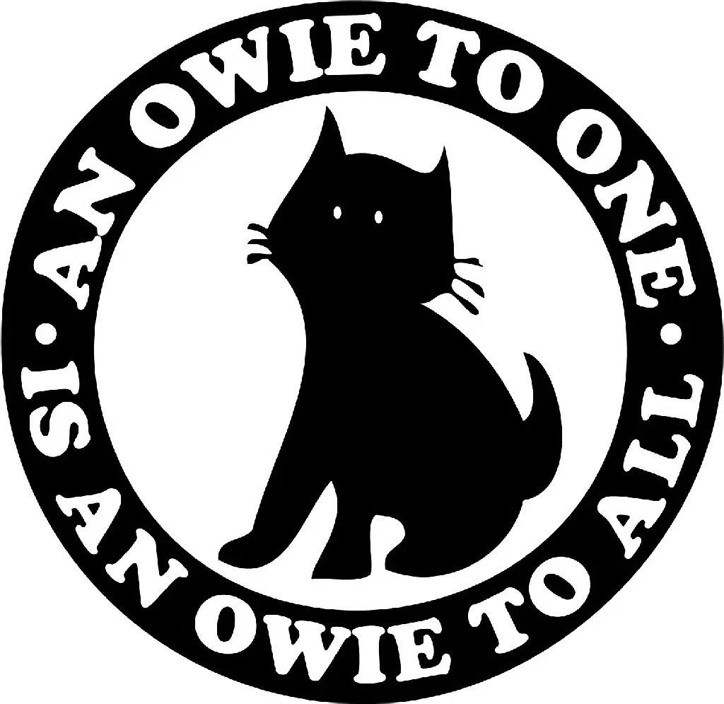 A black circle with white text on it saying &quot;An owie to one is an owie to all.&quot; Inside the circle is a black cat which is drawn, not a photo.