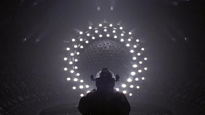 Foreboding, dark sphere surrounded by a concentric ring of lights, from the 1997 horror movie Event Horizon