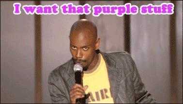 Black comedian with microphone "I want that purple stuff"