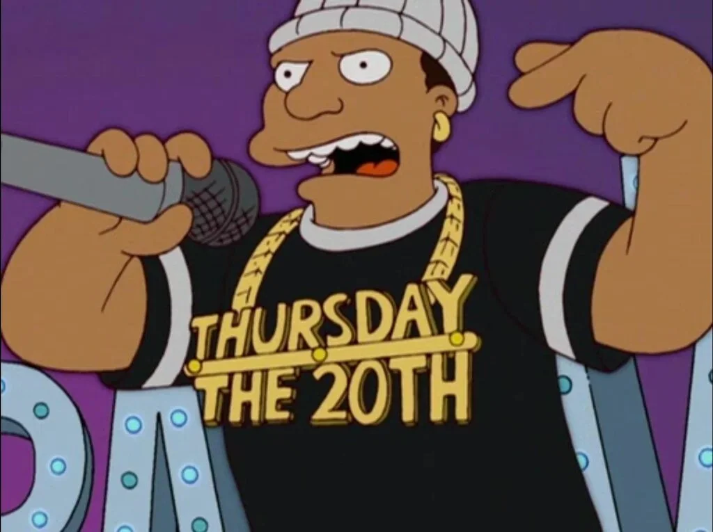 A still from The Simpsons S16E09 in which a rapper is wearing a chain saying "Thursday the 20th"