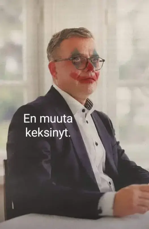 Meemi. Käsitelty kuva Petteri Orposta paskasti tehdyissä klovnimeikeissä, tekstillä "En muuta keksinyt."