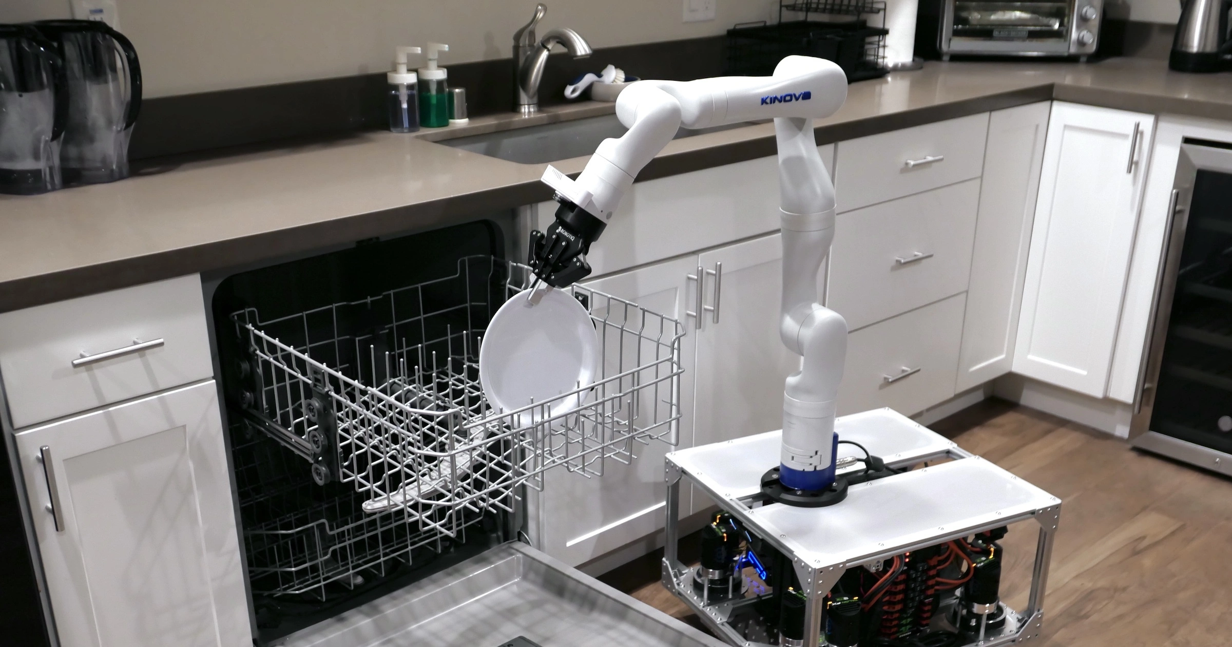 TidyBot++: An Open-Source Holonomic Mobile Manipulator for Robot Learning